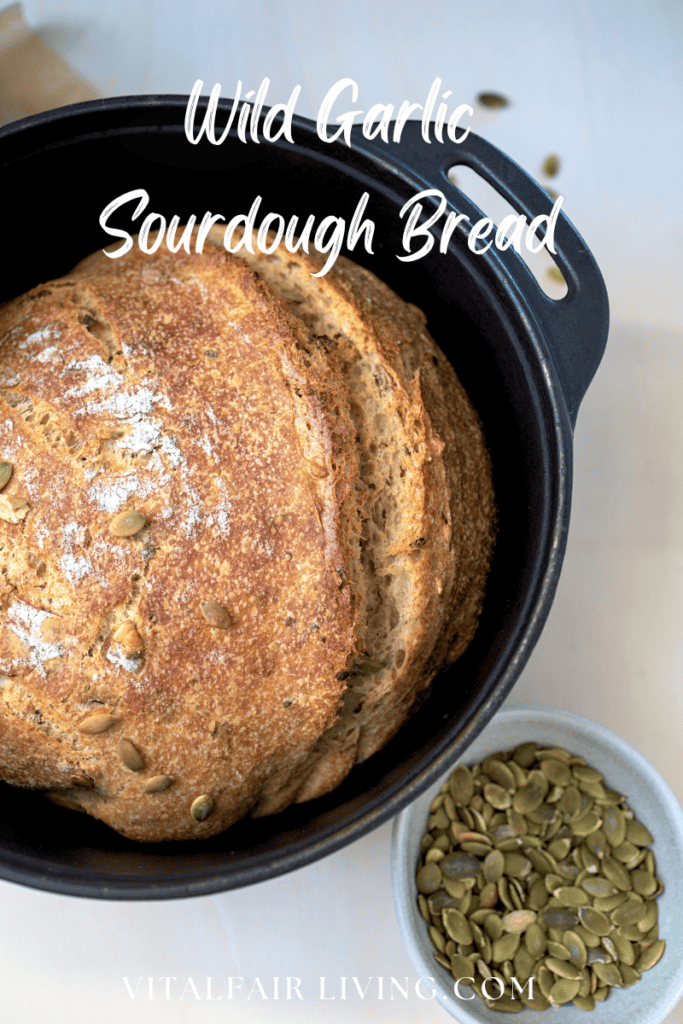 Wild Garlic Sourdough Bread in a cast iron skillet.